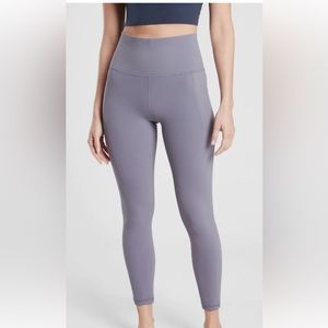 Athleta salutations stash pocket leggings size large